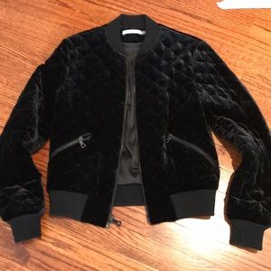 Black velvet quilted bomber jacket.